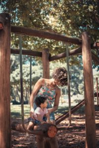 toddler and mom playing